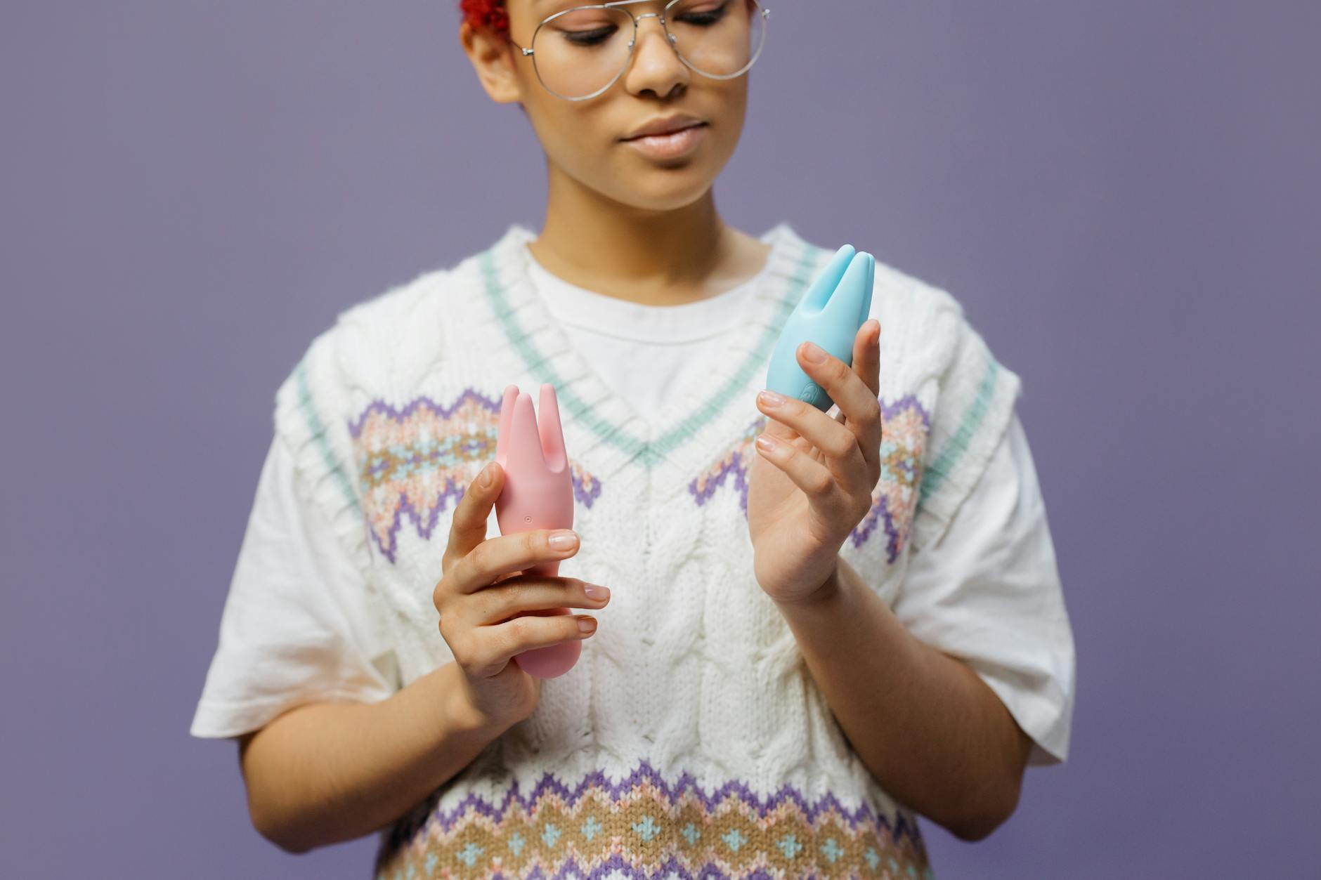 Fresh lemon halves on pink background in sunlight, symbolizing freshness and the Lem vibrator brand